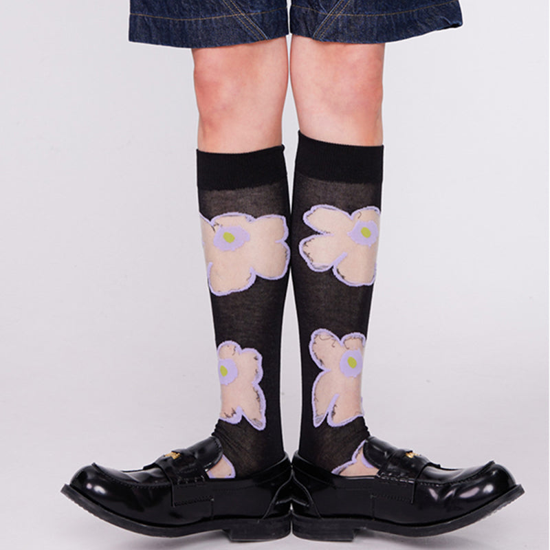 Transparente Socken aus Glas mit Blumenmuster in Lila