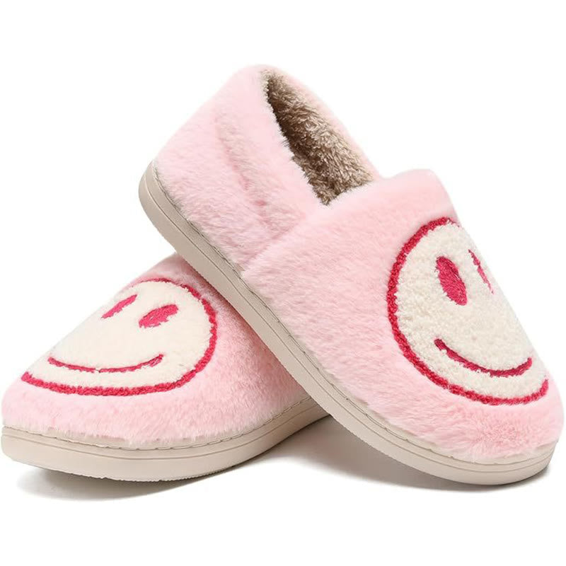 Bunte Hausschuhe mit Smiley-Gesicht in Übergröße