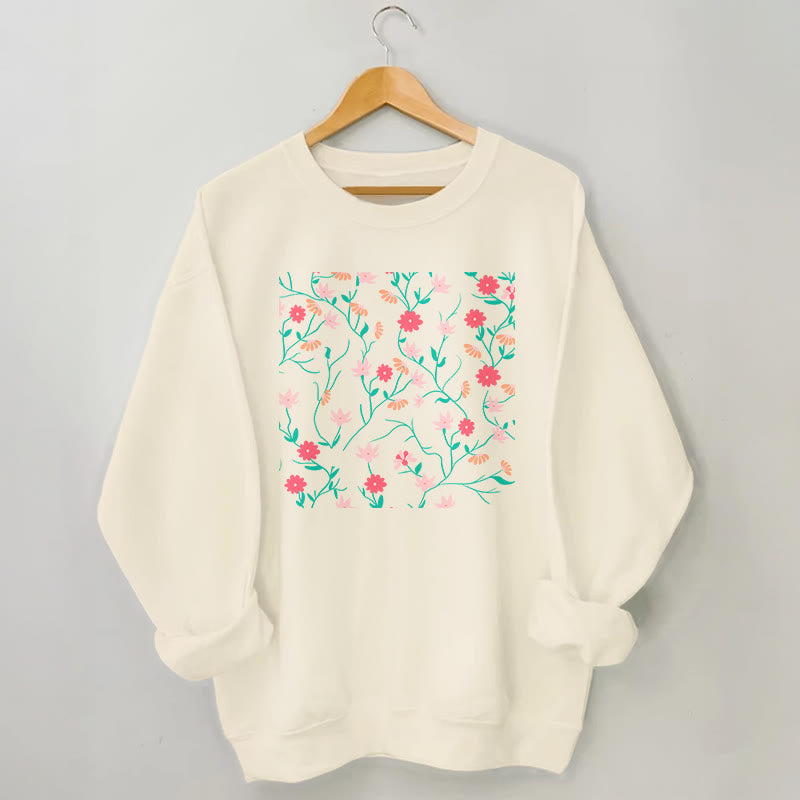Sweatshirt mit Blumenmuster in Rot und Rosa in Übergröße - Aprikose - 3XL - image 1