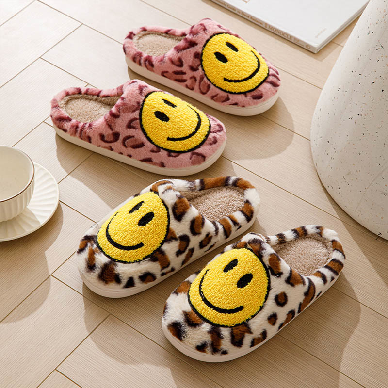 Gelbe Hausschuhe mit Smiley-Motiv in Übergröße