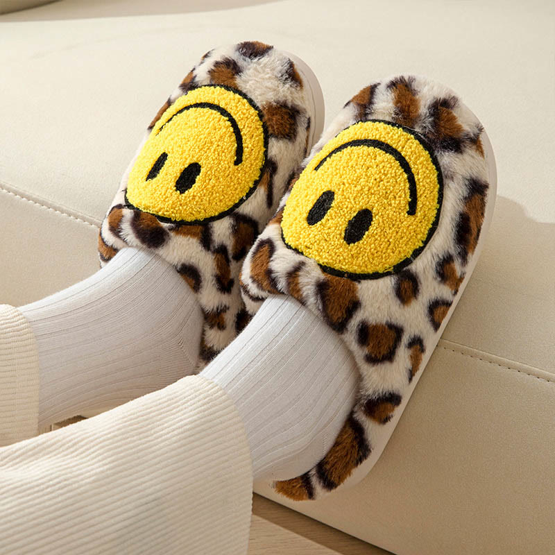 Gelbe Hausschuhe mit Smiley-Motiv in Übergröße