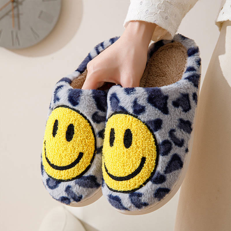 Gelbe Hausschuhe mit Smiley-Motiv in Übergröße