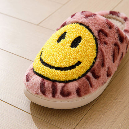 Gelbe Hausschuhe mit Smiley-Motiv in Übergröße