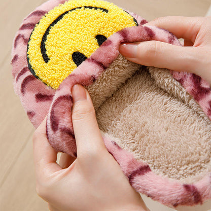 Gelbe Hausschuhe mit Smiley-Motiv in Übergröße