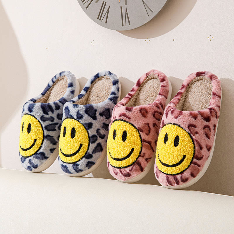 Gelbe Hausschuhe mit Smiley-Motiv in Übergröße