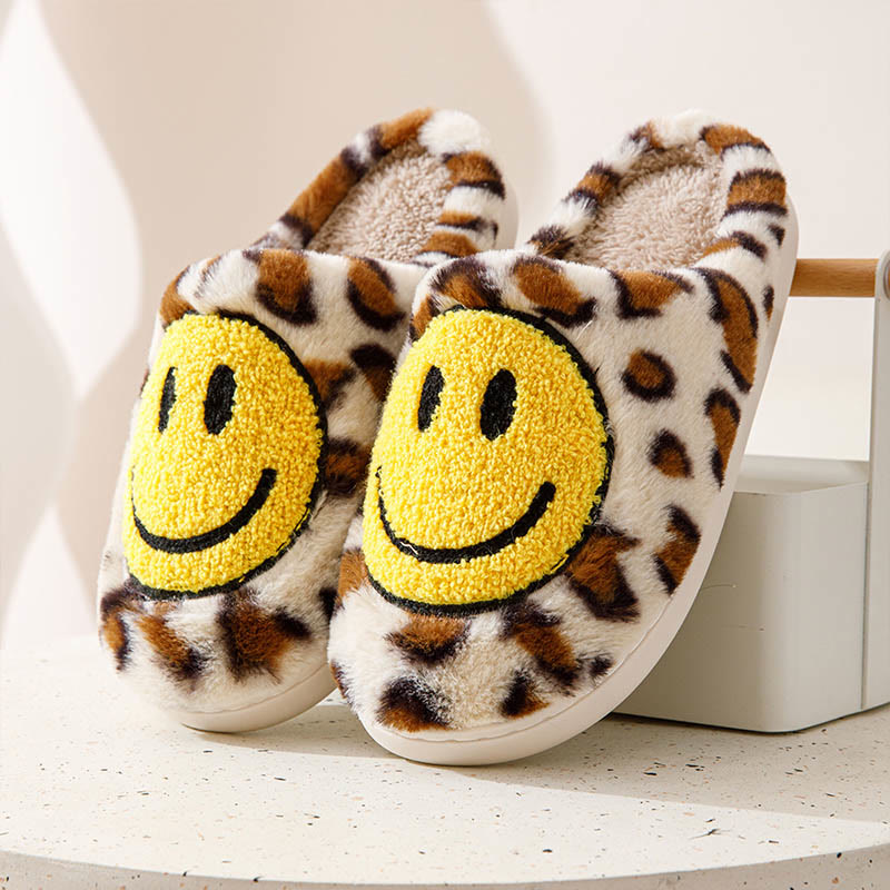 Gelbe Hausschuhe mit Smiley-Motiv in Übergröße