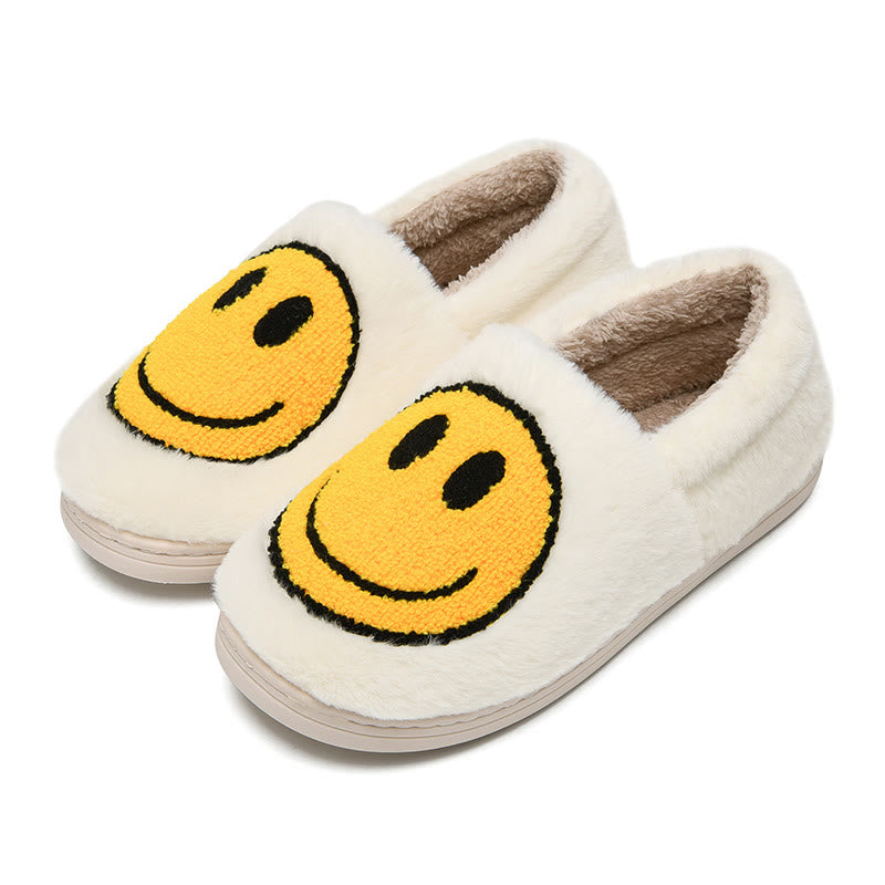 Bunte Hausschuhe mit Smiley-Gesicht in Übergröße