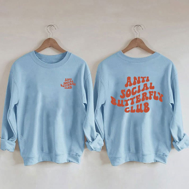 Orangefarbenes Sweatshirt mit Text in Übergröße
