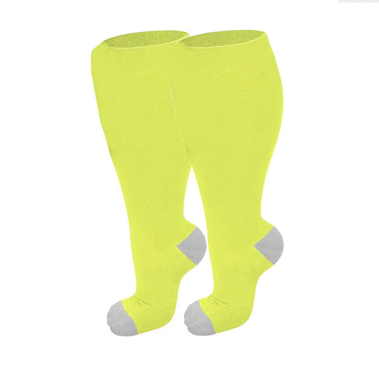 Fluoreszierende grüne Kompressionsstrümpfe in Übergröße