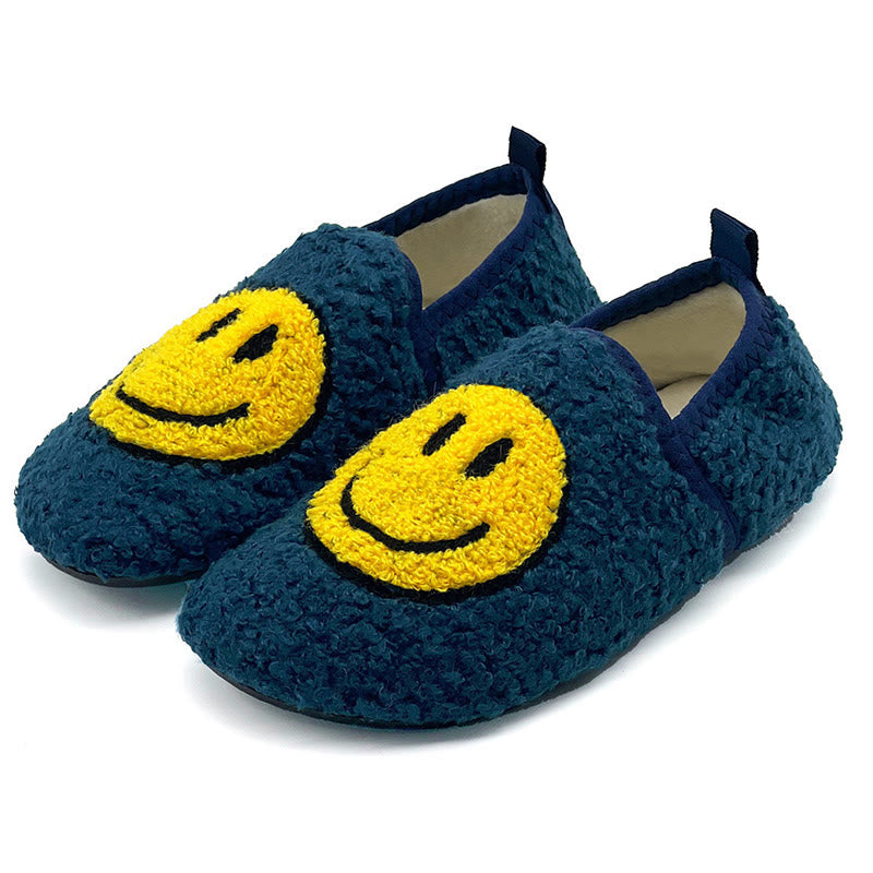 Rosa Hausschuhe mit Smiley-Motiv in Übergröße