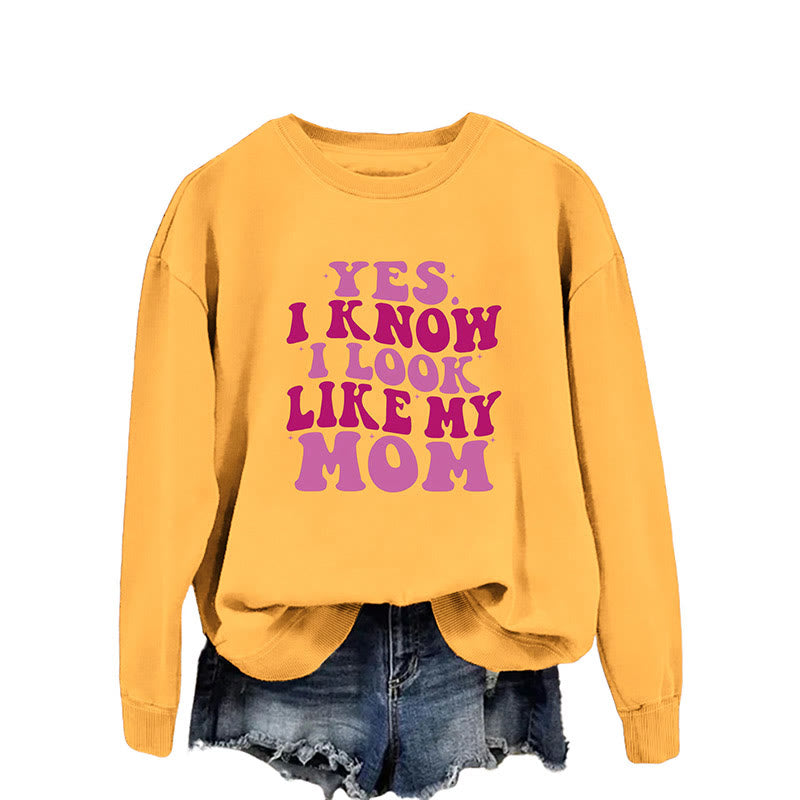 Lila Sweatshirt mit Buchstaben in Übergröße