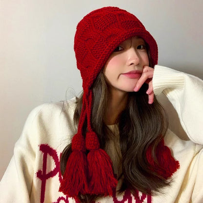 Modische Beanie mit Quaste - image 1