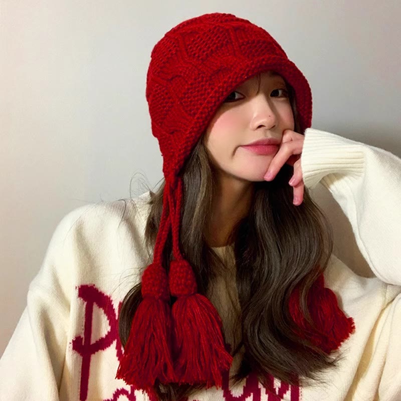 Modische Beanie mit Quaste - image 1