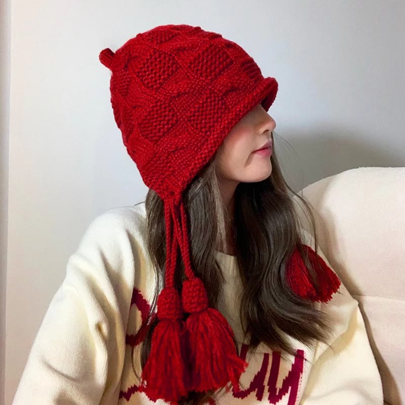 Modische Beanie mit Quaste - image 0