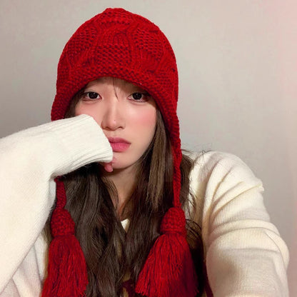 Modische Beanie mit Quaste - image 2