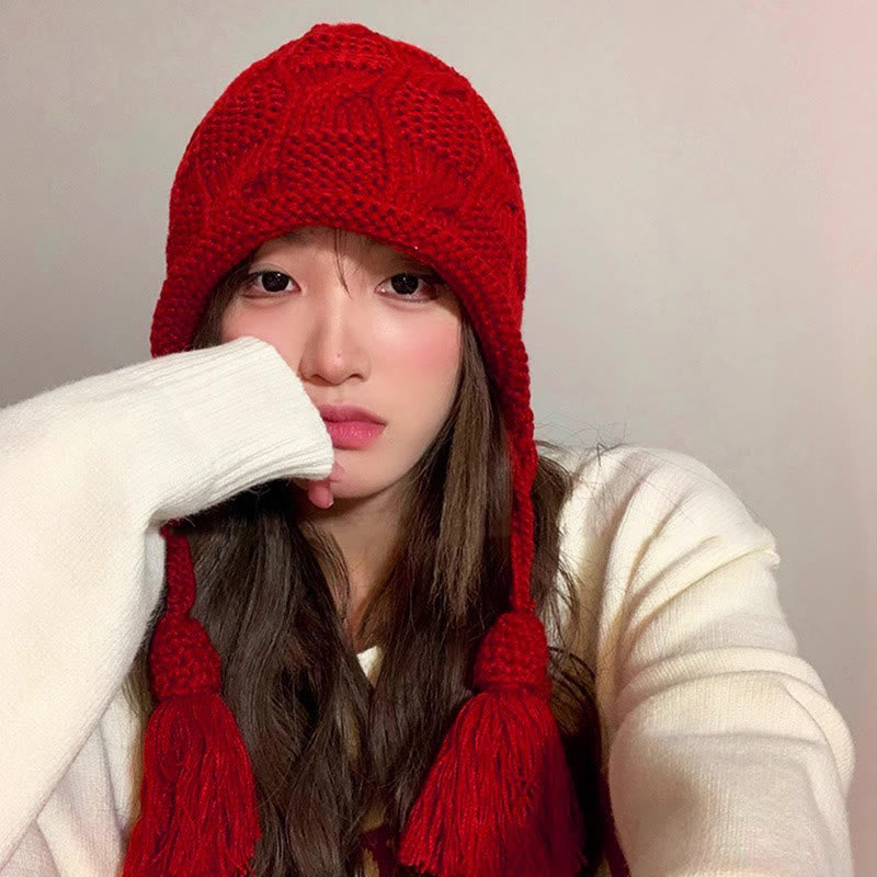 Modische Beanie mit Quaste - image 2