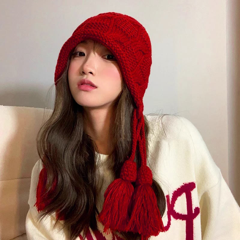 Modische Beanie mit Quaste - image 3