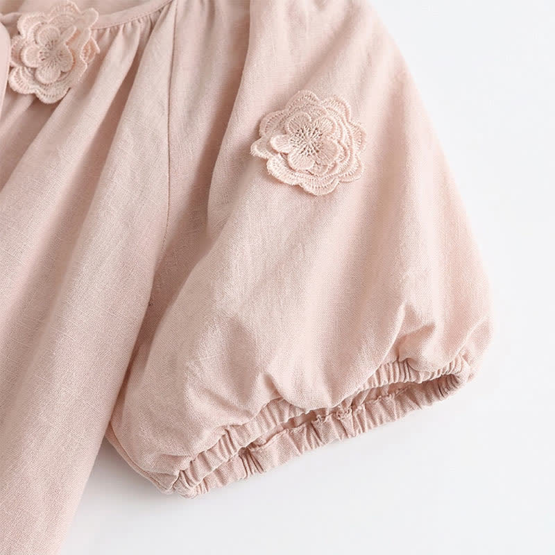 Bluse mit floralen Applikationen, Puffärmeln und Bindeband vorne - image 5