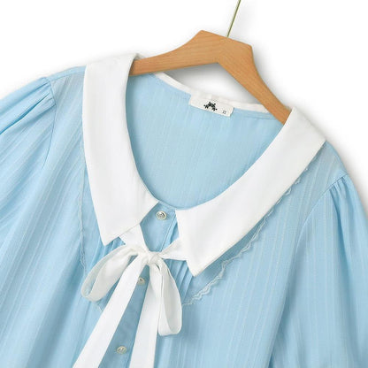Plus Size Kleid in Blau mit Kontrastkragen, Schleife und Rüschensaum - image 1