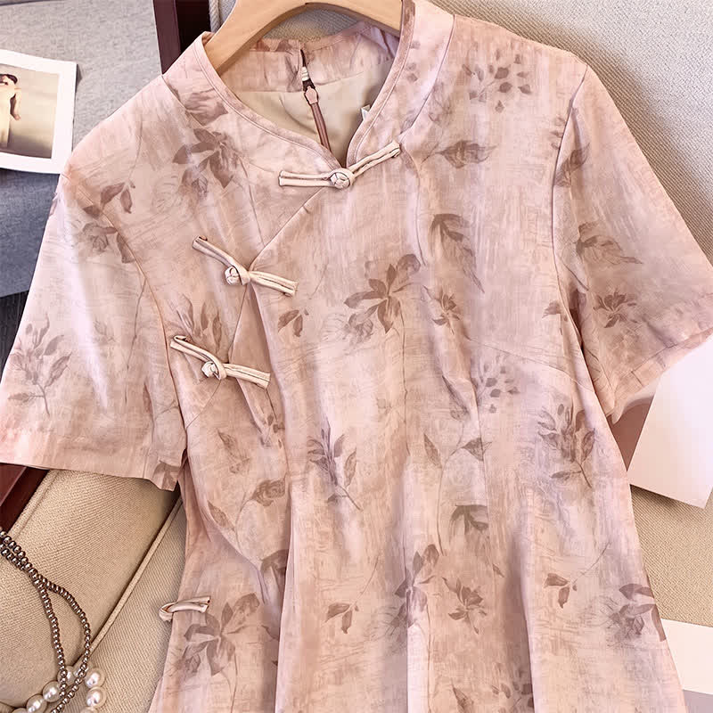 Midikleid mit Blumenmuster, Stehkragen und kurzen Ärmeln - image 1