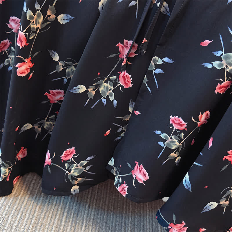 Schwarzes Midikleid mit Blumenmuster in Übergröße - image 4