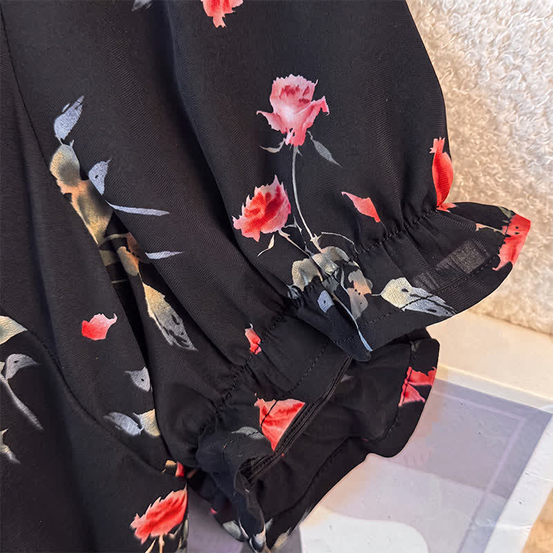 Schwarzes Midikleid mit Blumenmuster in Übergröße - image 2