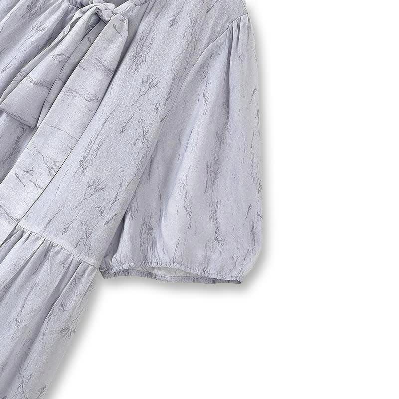 Romantisches Maxikleid mit Schleifenausschnitt - image 1