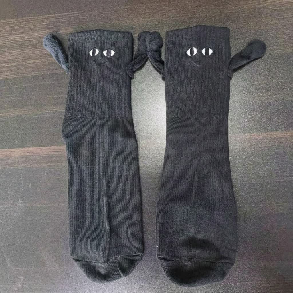 Magnetische Socken mit lächelnder Hand, die ein Vierteldollarstück hält (2 Paar) - image 4