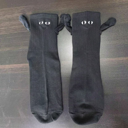 Magnetische Socken mit lächelnder Hand, die ein Vierteldollarstück hält (2 Paar) - image 4