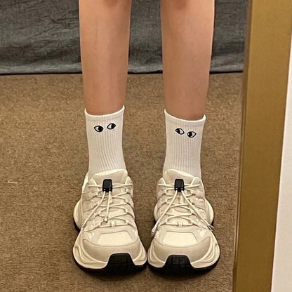 Magnetische Socken mit lächelnder Hand, die ein Vierteldollarstück hält (2 Paar) - image 2