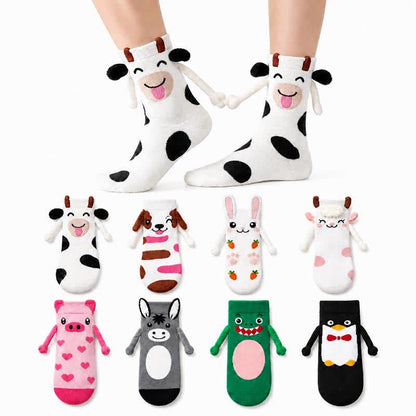 Kuschelige Socken mit Tiermotiven, die eine Hand halten (2 Paar) - image 0
