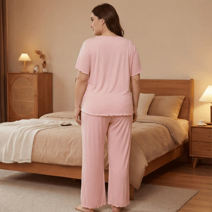 Plus Size Pyjama-Set aus weichrosa Spitzenbesatz - image 2