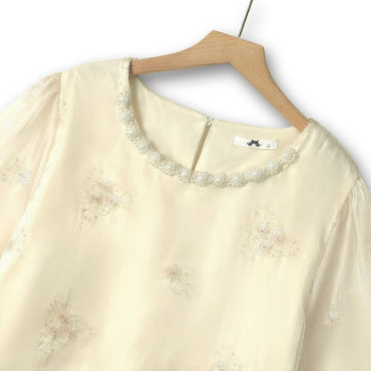 Bluse in Übergröße mit floralem Spitzenmuster und strukturiertem Ausschnitt - image 1