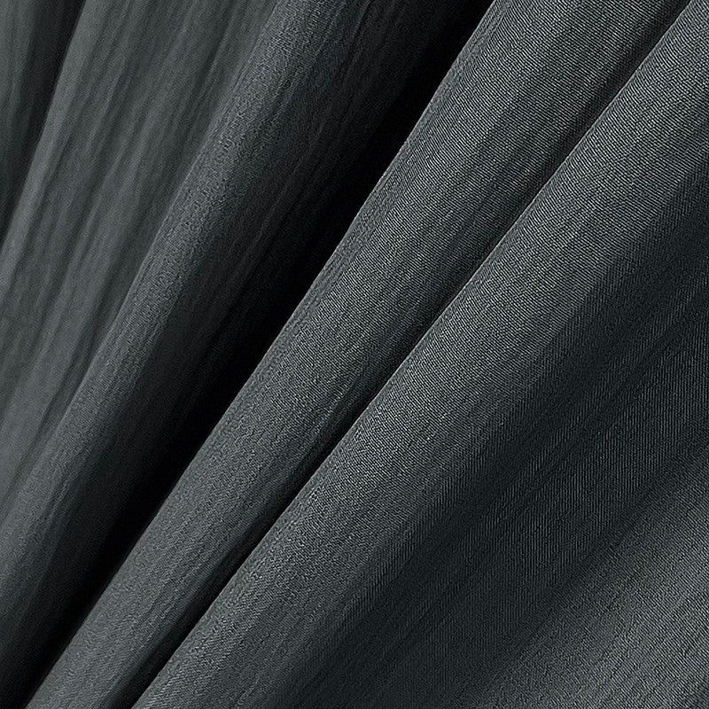 Zweiteiliges Set aus asymmetrisch drapiertem Oberteil und plissiertem Midirock - image 4