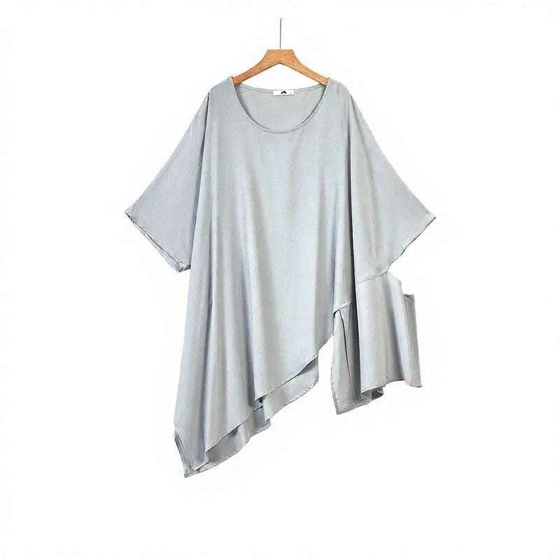 Zweiteiliges Set aus asymmetrisch drapiertem Oberteil und plissiertem Midirock - image 1